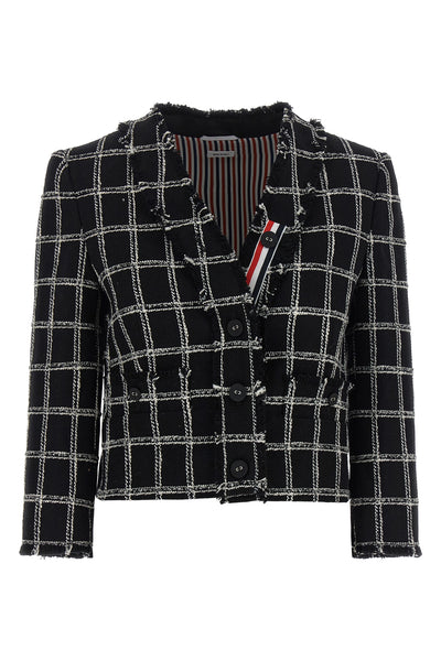 the thom browne cardigan jacket reinterprets the codes of tailoring through a cr