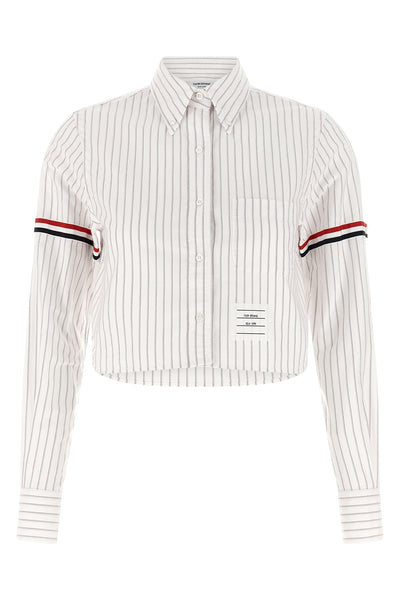 the thom browne cropped shirt reinterprets the codes of classic tailoring throug
