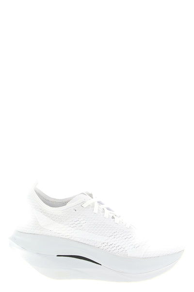 comme des garçons x mizuno wave rebellion pro 3 sneakers in openwork and breat
