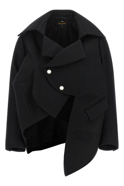 the comme des garçons blazer redefines traditional tailoring through an asymmetr