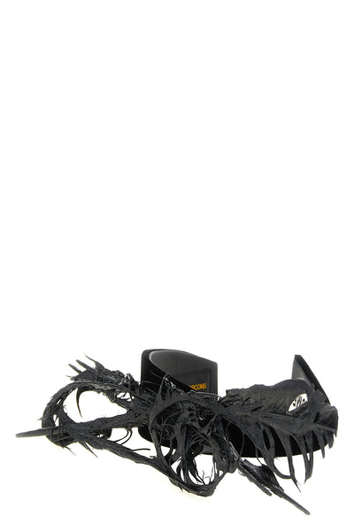the comme des garcons headband redefines the accessory through an avant-garde ae