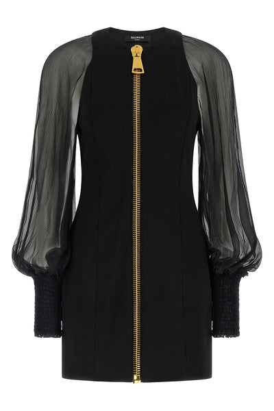 the balmain black mini dress redefines the codes of elegance through a sophistic