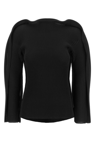 the issey miyake top redefines the female silhouette through a complex textile a
