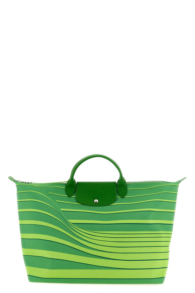 the longchamp le pliage maison unique travel bag stands out for its trapezoidal