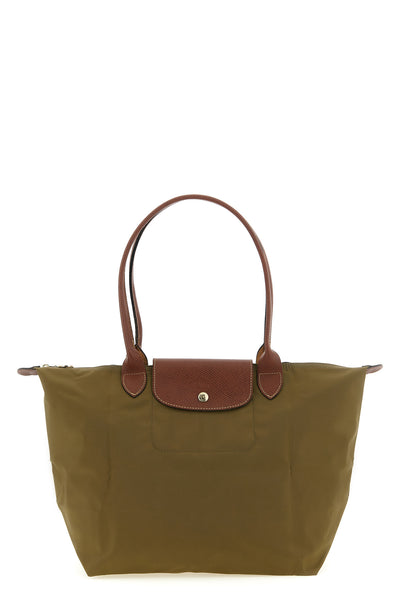 the longchamp le pliage original l shoulder bag is distinguished by a capaciou