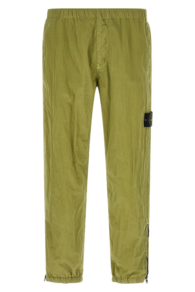 3100035 joggers in stone island nylon metal fabric subjected to a double wrink