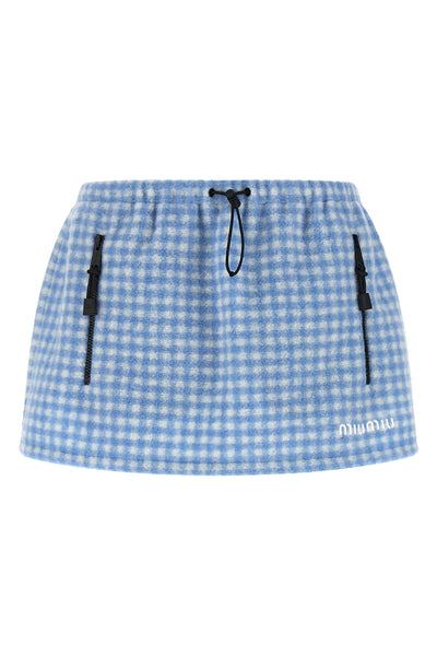 the miu miu miniskirt redefines casual volumes through a short and structured si