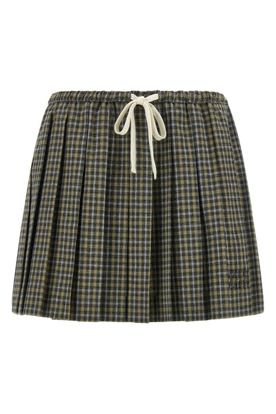 the miu miu mini skirt reinterprets the codes of the collegiate wardrobe through
