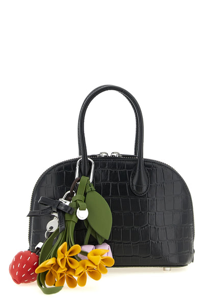 the self-portrait mini bag defines a new elegance through a structured dome silh