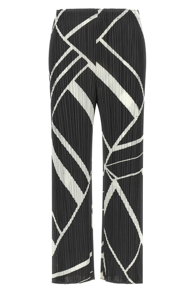 the fold line pleats please pants redefine the silhouette through a rigorous a