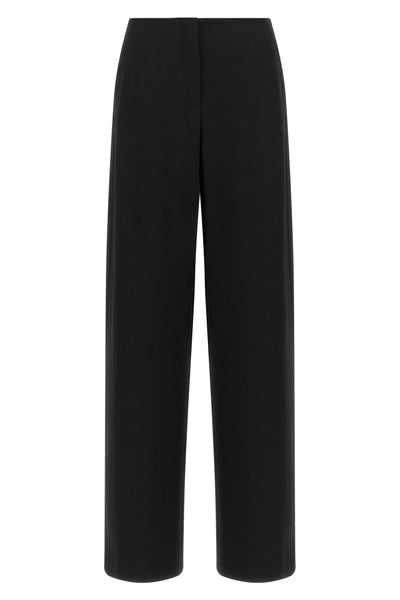 the row farah trousers embody the essence of sartorial minimalism through a wi