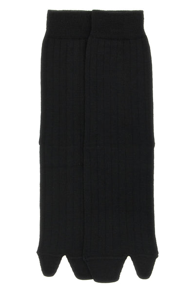 maison margielas black wool blend socks redefine the daily accessory through th