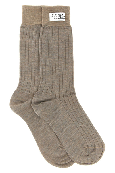 maison margiela mm6 socks redefine the essentiality of everyday wardrobe through