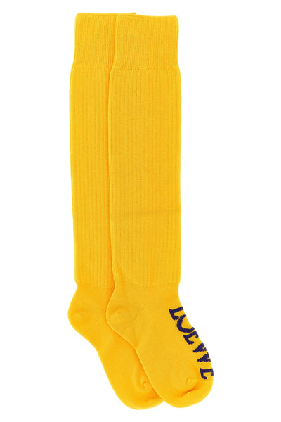 loewe high socks redefine the everyday accessory through a vibrant yellow hue an