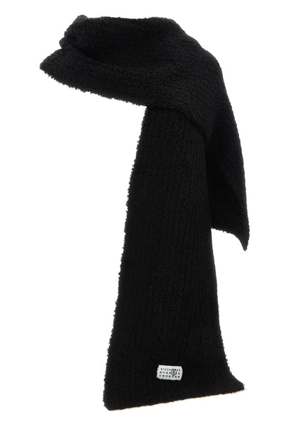 the maison margiela mm6 scarf is distinguished by an elongated rectangular const
