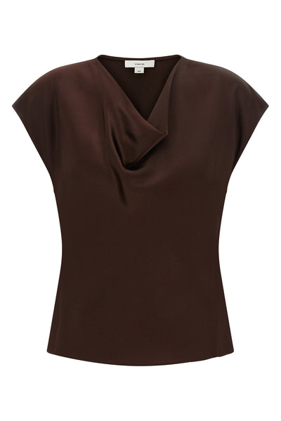 the vince blouse sets a new standard of essential elegance