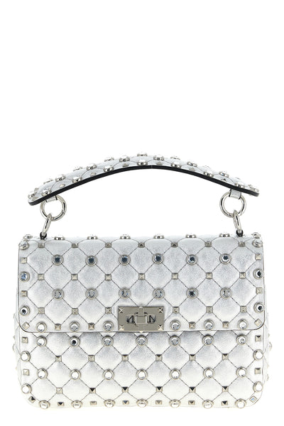 rockstud spike shoulder bag in laminated soft nappa leather