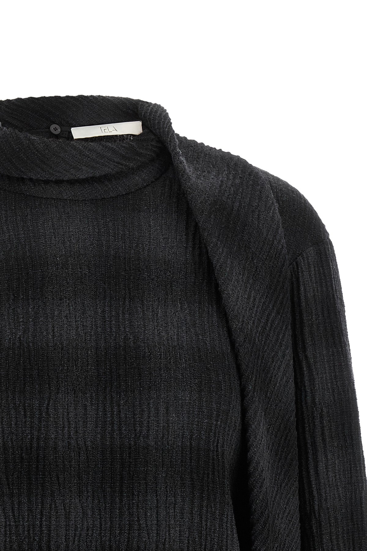 the venus tela blouse redefines contemporary tailoring through a distinctive mat