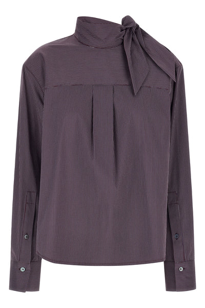 the zafrina canvas blouse redefines the codes of contemporary tailoring throug