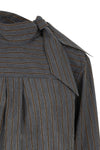the zafrina canvas blouse redefines the codes of everyday tailoring through a