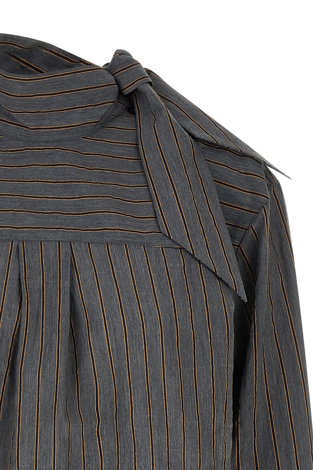 the zafrina canvas blouse redefines the codes of everyday tailoring through a