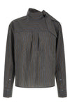 the zafrina canvas blouse redefines the codes of everyday tailoring through a