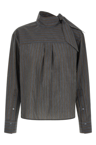 the zafrina canvas blouse redefines the codes of everyday tailoring through a