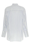 the dayane shirt by tela redefines the codes of everyday tailoring through a g