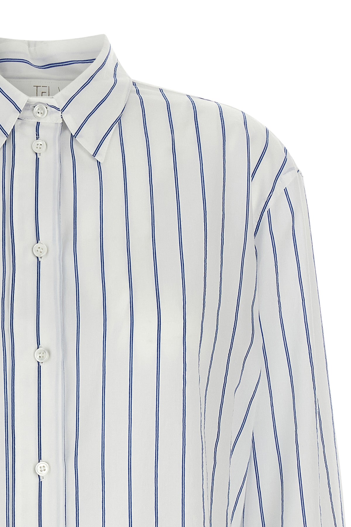 the dayane shirt by tela redefines the codes of everyday tailoring through a g