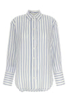 the dayane shirt by tela redefines the codes of everyday tailoring through a g