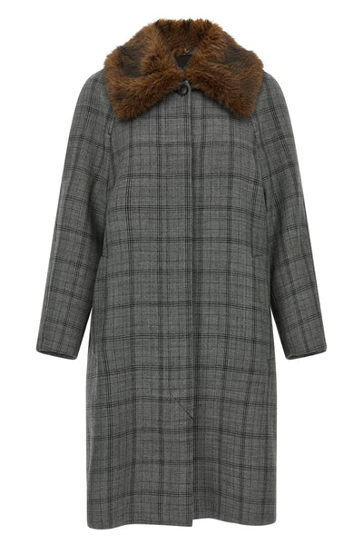 the long tela gavin coat defines the codes of contemporary outerwear through a