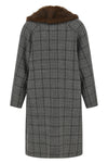 the coat tela defines the codes of contemporary outerwear through a model