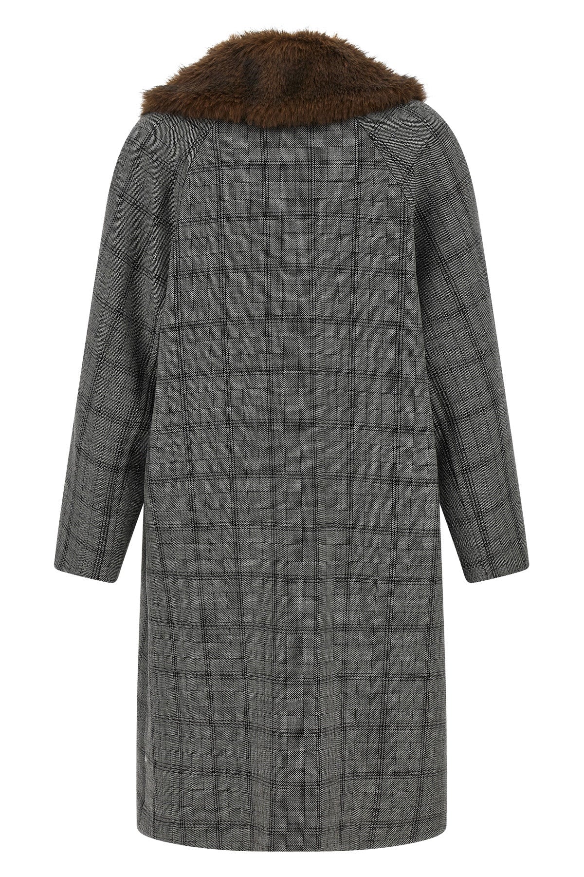 the coat tela defines the codes of contemporary outerwear through a model