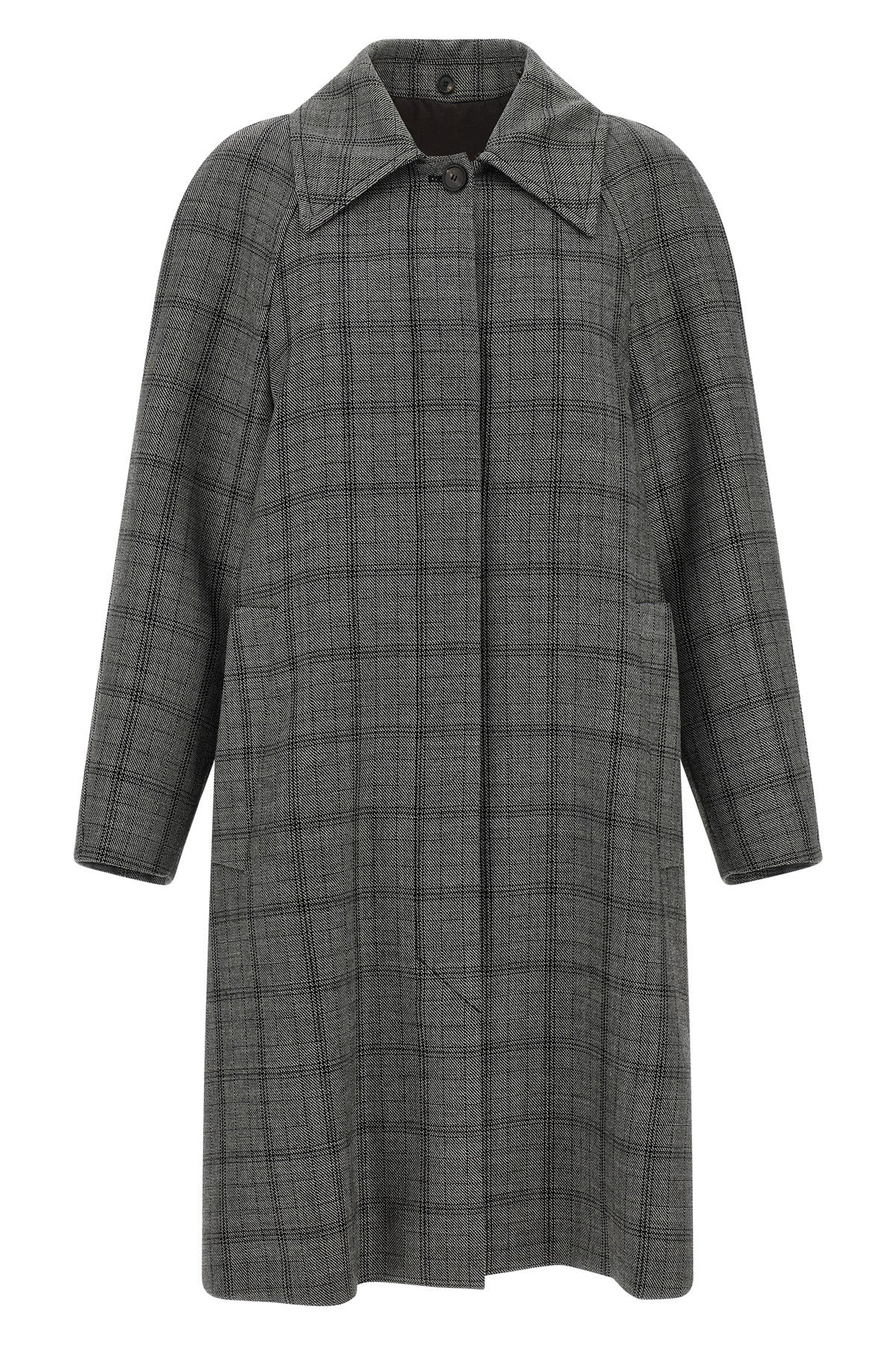the coat tela defines the codes of contemporary outerwear through a model
