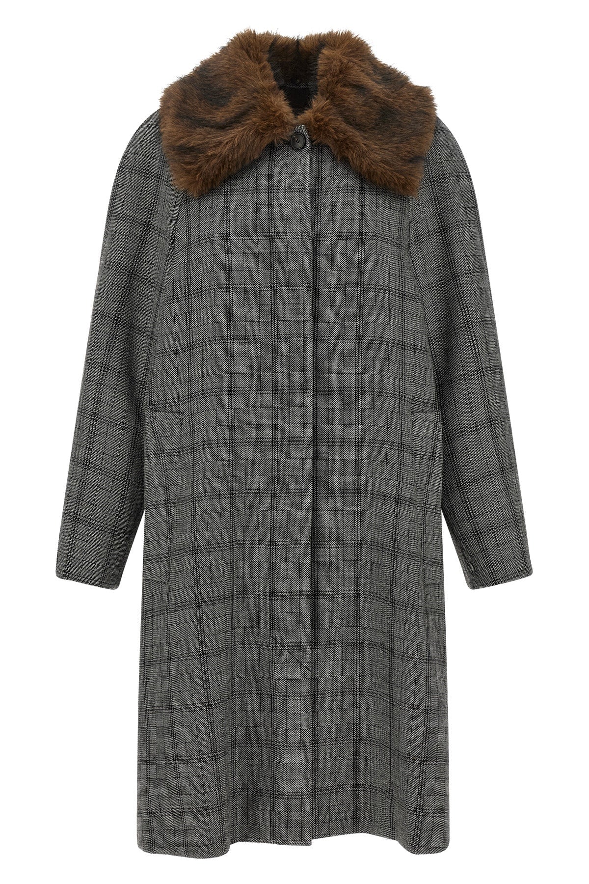 the coat tela defines the codes of contemporary outerwear through a model