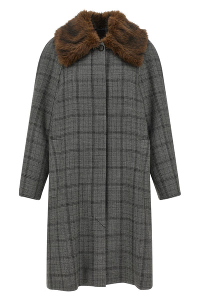 the coat tela defines the codes of contemporary outerwear through a model