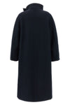 the scott coat by tela redefines the volumes of winter outerwear through a cocoo