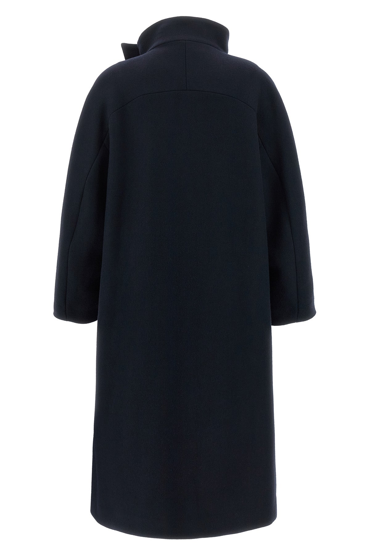 the scott coat by tela redefines the volumes of winter outerwear through a cocoo