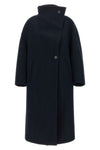 the scott coat by tela redefines the volumes of winter outerwear through a cocoo
