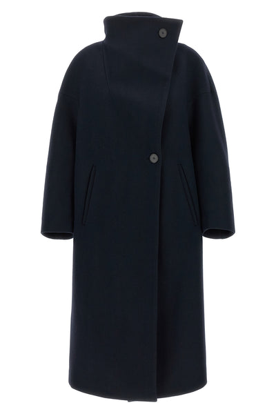 the scott coat by tela redefines the volumes of winter outerwear through a cocoo