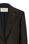 the tela miranda blazer redefines contemporary tailoring through an oversized