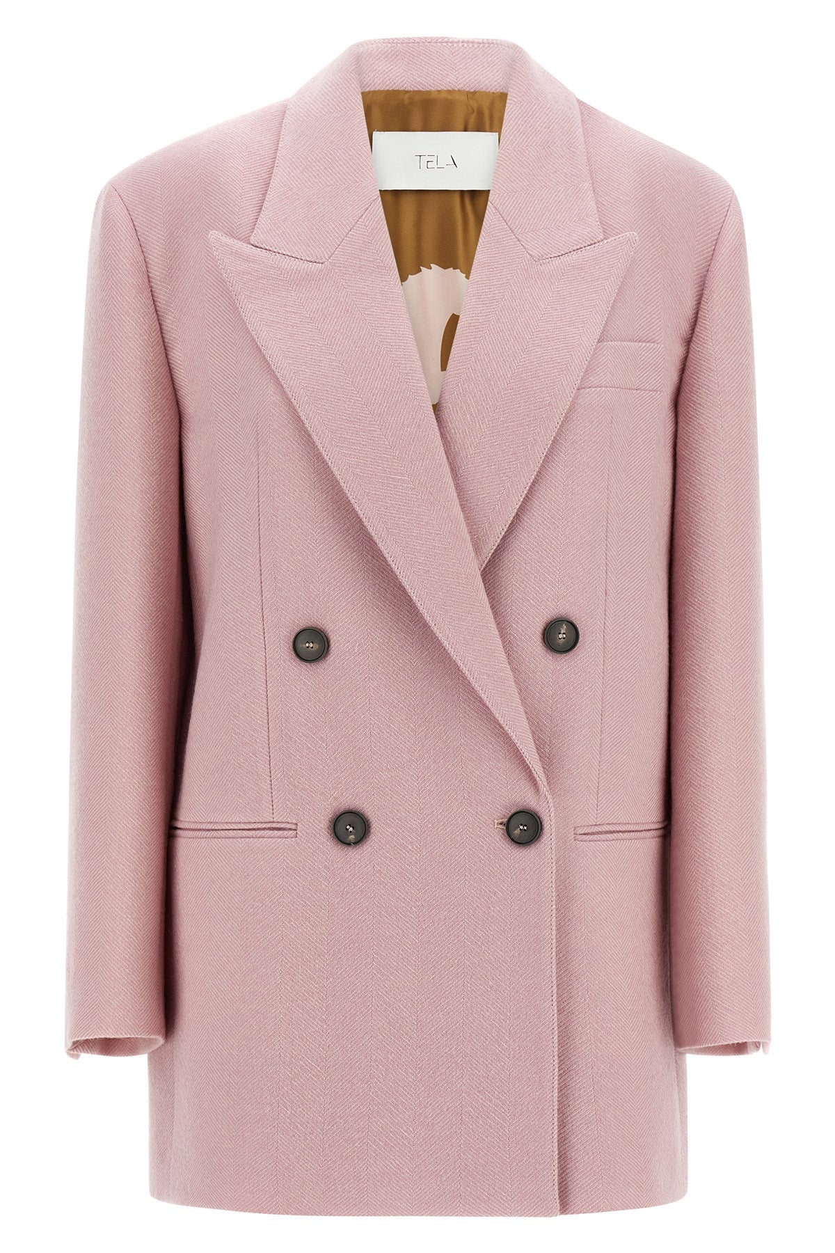 the tela nomade blazer redefines the codes of tailoring through a rigorous doubl