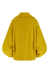 the seth tela coat redefines the outerwear through a bold and structured silho