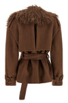 the giuseppe di morabito short coat redefines the codes of outerwear through bol