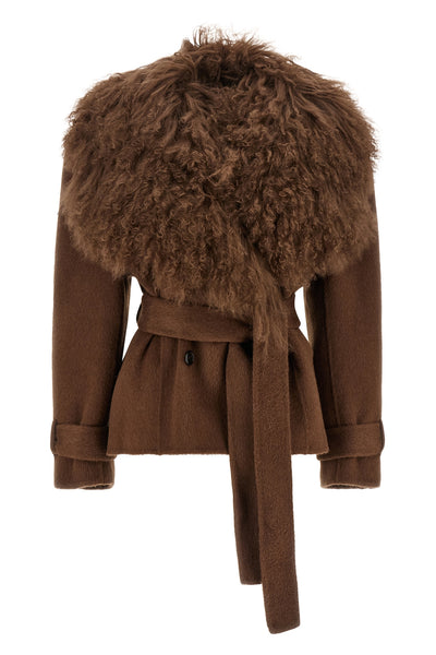 the giuseppe di morabito short coat redefines the codes of outerwear through bol