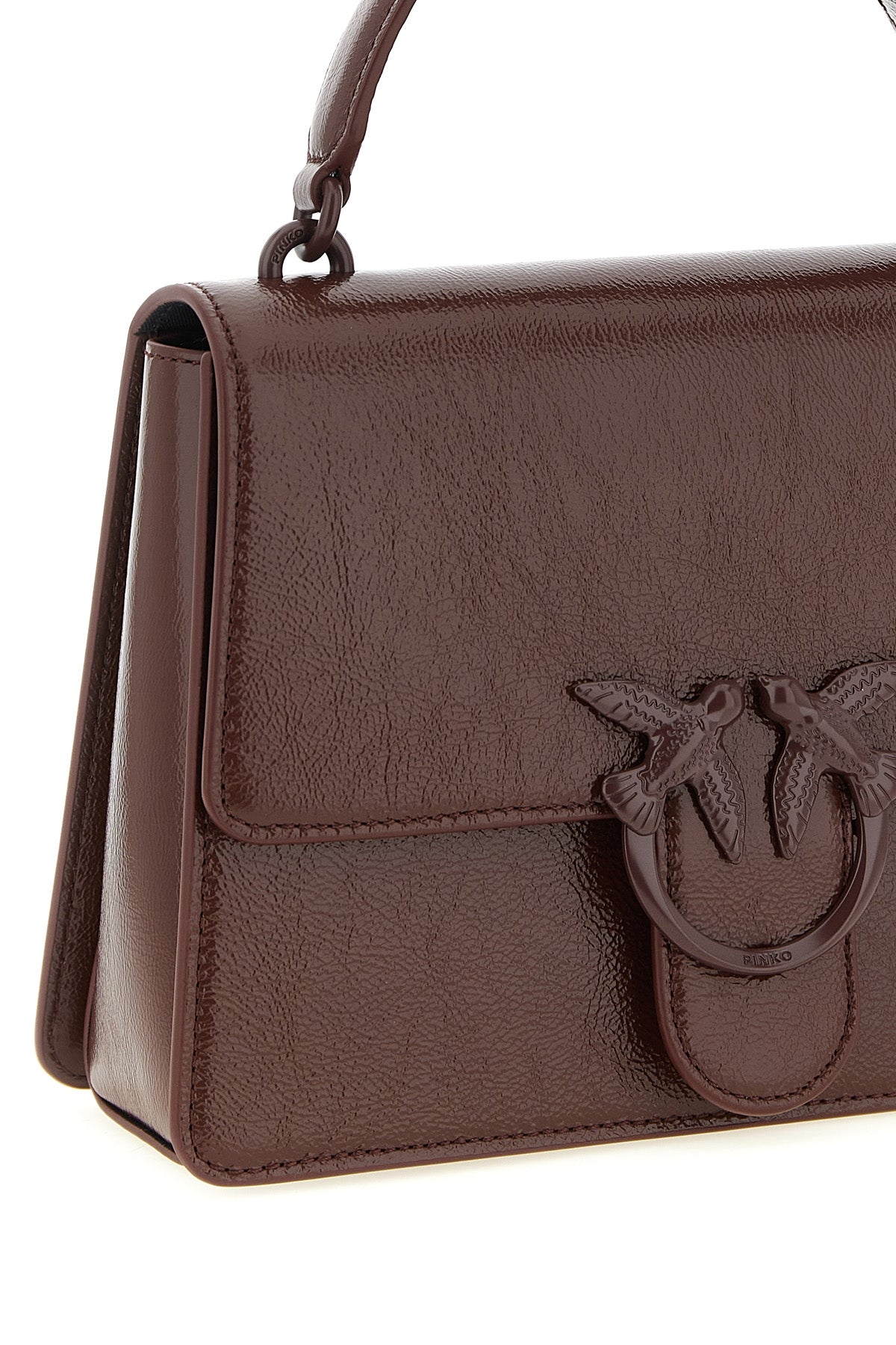 love one classic light vintage shiny leather handbag