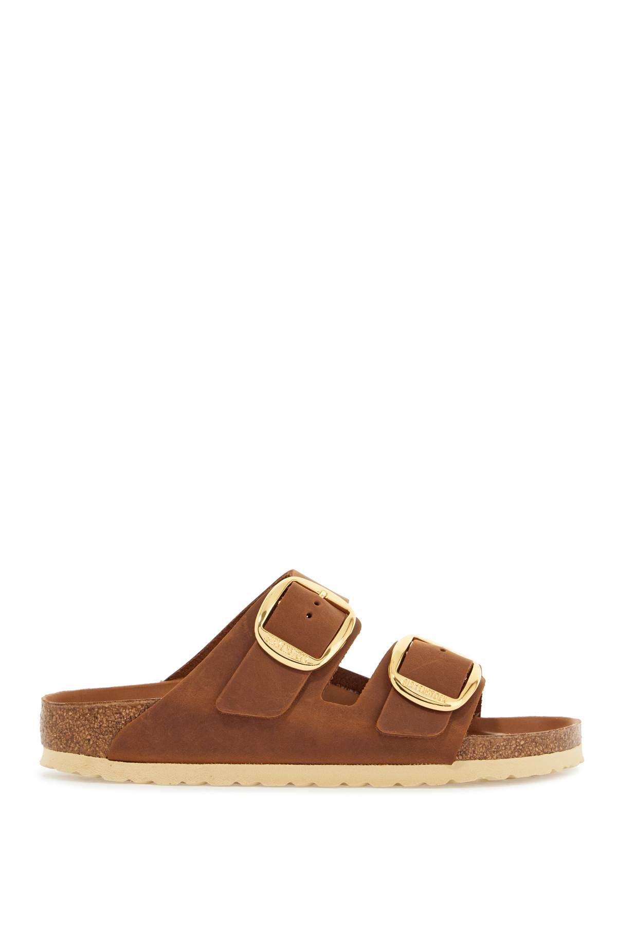 oiled leather cognac slippers with large golden buckles