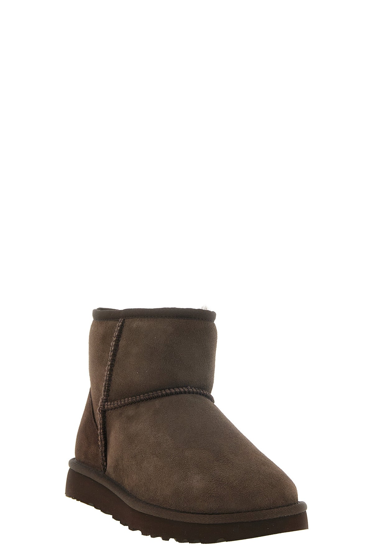 the classic mini ii ugg ankle boots redefine the iconic silhouette of the bran
