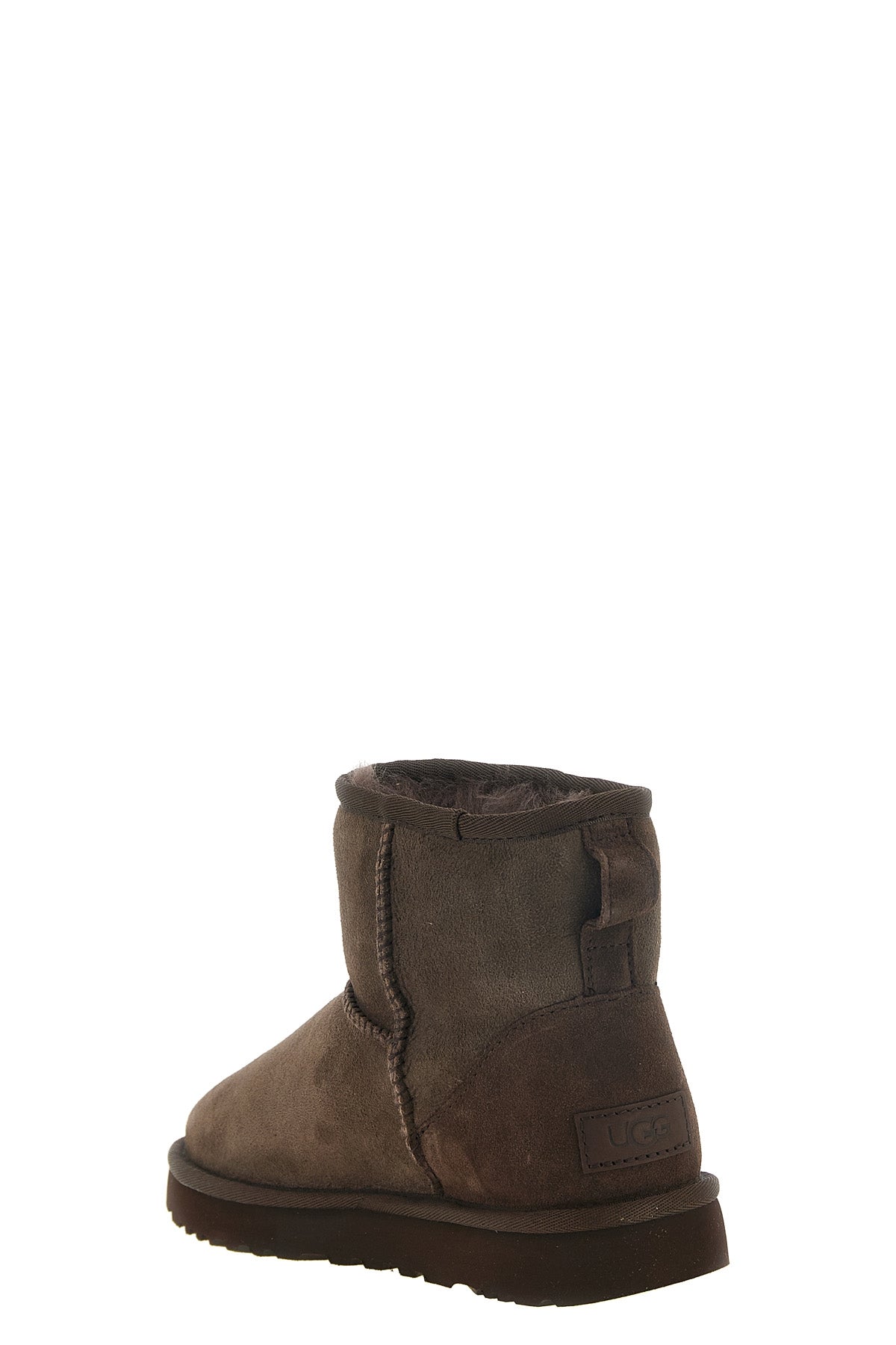 the classic mini ii ugg ankle boots redefine the iconic silhouette of the bran