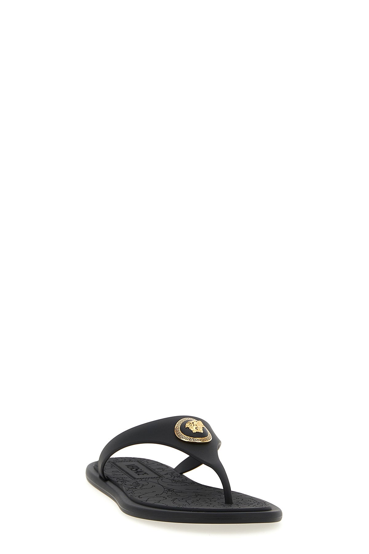 alia flat sandals in rubber